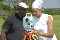 Dr. Anna Agbe-Davies and NSF student Joshua Brown use total station for coordinate measurements